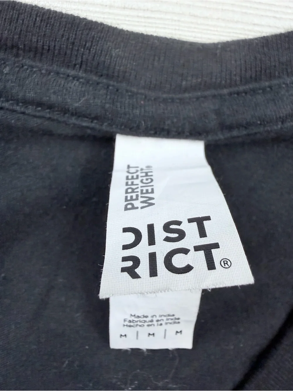 District Black Tee with White 'No Shave Movember' Graphic